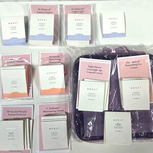 Lot of 60 MONAT skincare samples and travel bag!